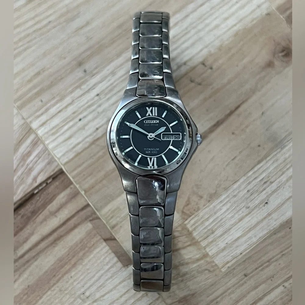 Citizen Eco-Drive Titanium Solar Black Dial Day Date Window Titanium Bracelet